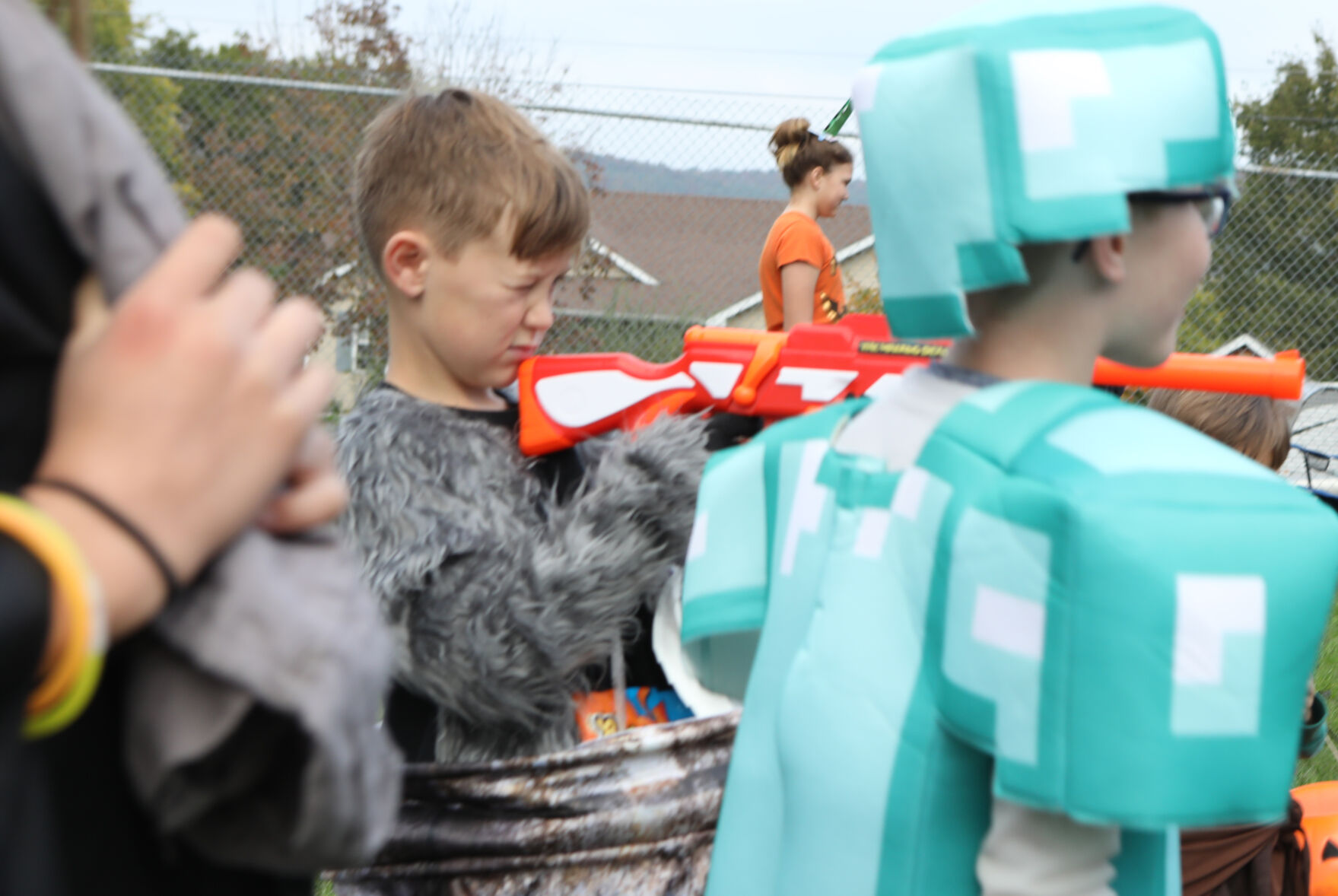 Liam Winkelmeier aims a Nerf gun